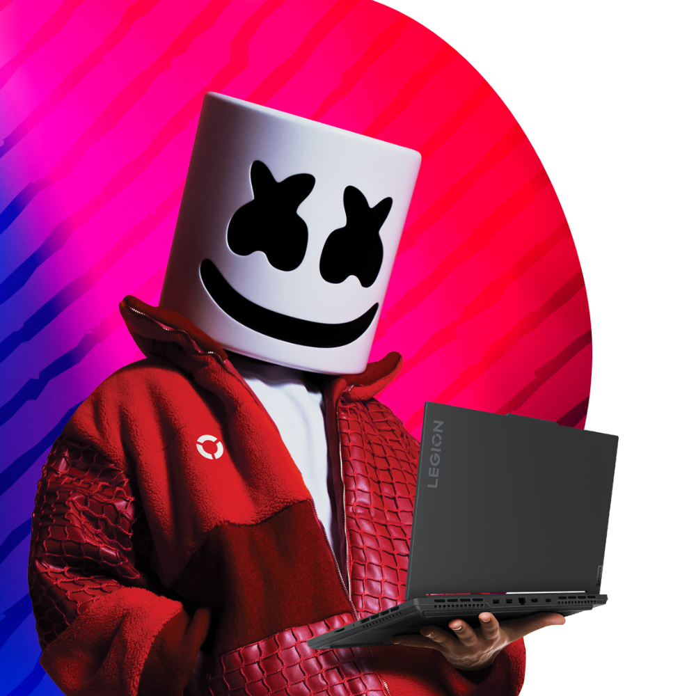 Marshmello in a Lenovo Legion-branded jacket holding a Legion laptop